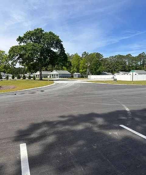 Additional parking at community entry