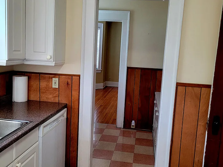 Kitchen and butlers pantry. Vinyl flooring.
