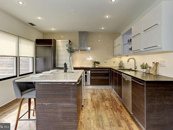 Superior finishes incl Sub Zero fridge+custom cab.