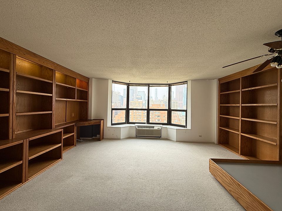Open Studio with Sleeping Area, Living Space, and Bright Window