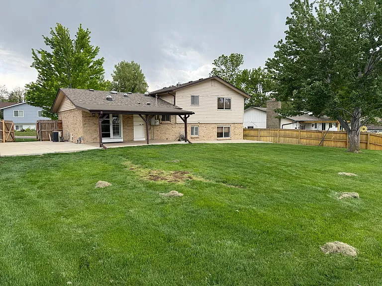 large fully fenced backyard (lawncare included in rent)