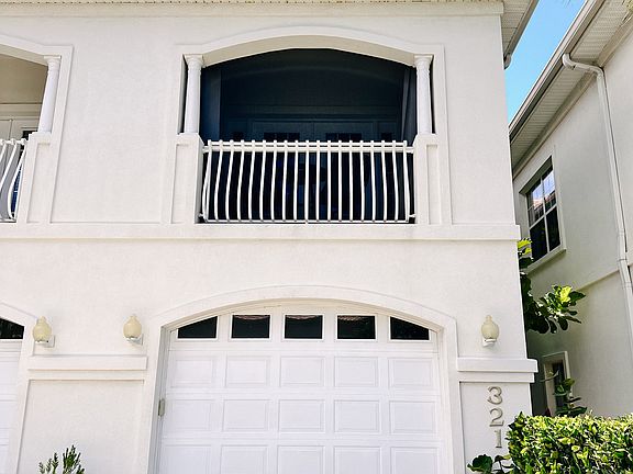 Two-Story Townhouse with screened east-facing porch off the living room. Garage is for owners storage. Plenty of parking.