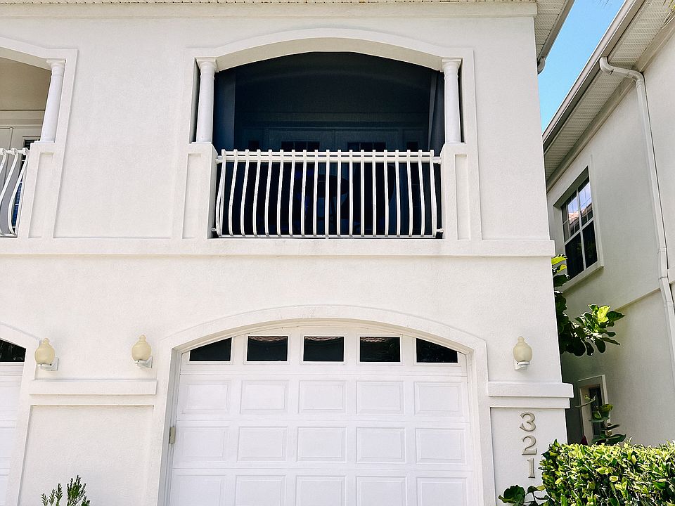 Two-Story Townhouse with screened east-facing porch off the living room. Garage is for owners storage. Plenty of parking.