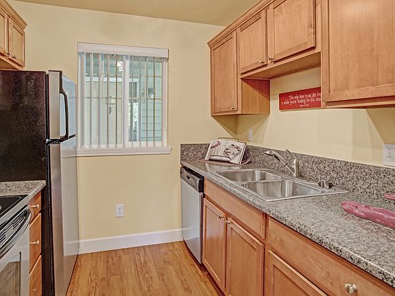 Kitchen with stainless steel appliances, lots of counter space, and plenty of cabinet storage