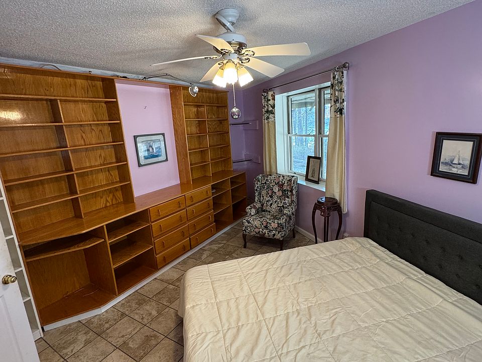 The shelving area and the master bedroom