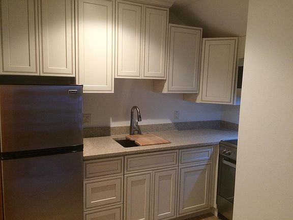 Kitchen sink includes cutting board