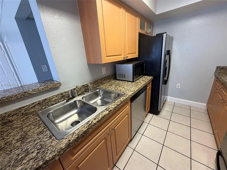 15560 SW 104th Ter #611 — Photo 9