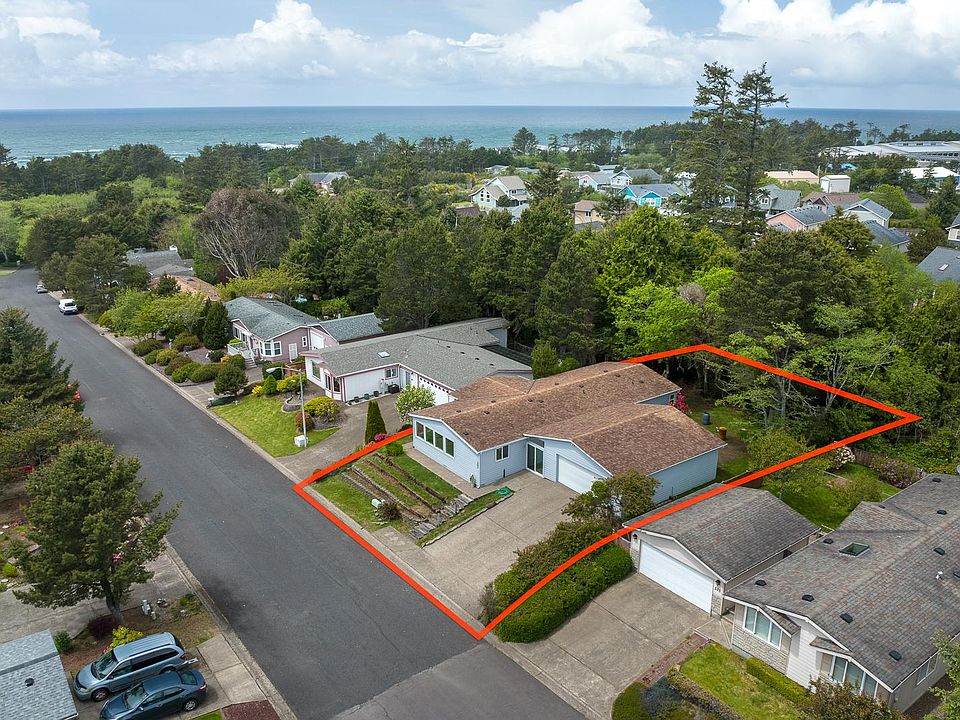 AERIAL VIEW FOR 303 NE 70TH ST,HOME & LARGE GARAGE W ATRIUM IN BETWEEN