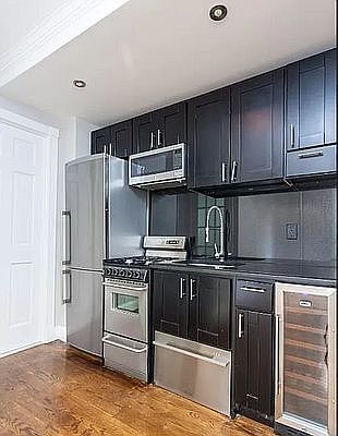 2nd image of 327 E 8th St APT 5B