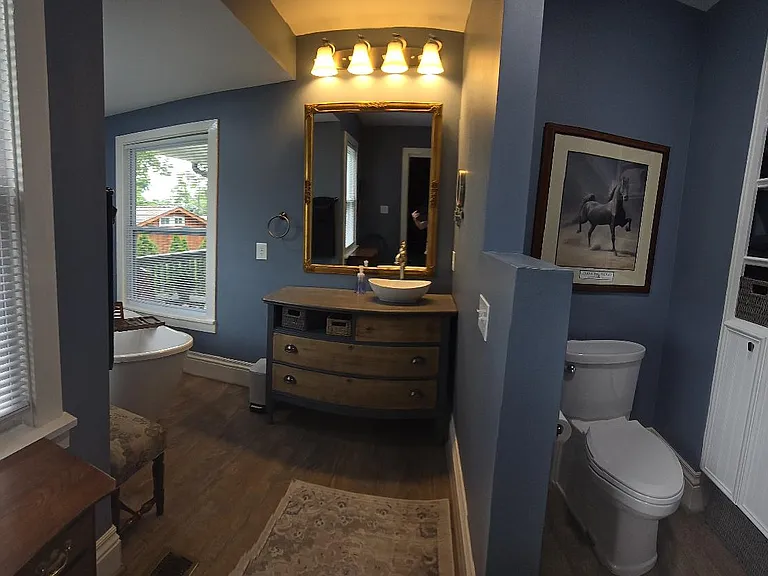 Panoramic view of master bath area.