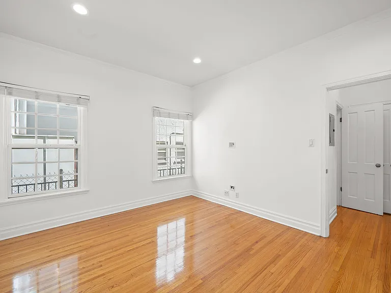 BEDROOM W/ HARDWOOD FLOORS & RECESSED LIGHTING