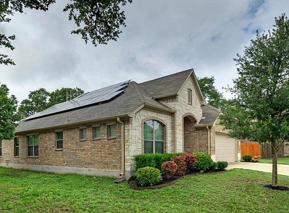Solar panels=huge savings! Also, note the garage is extended by 2'/
