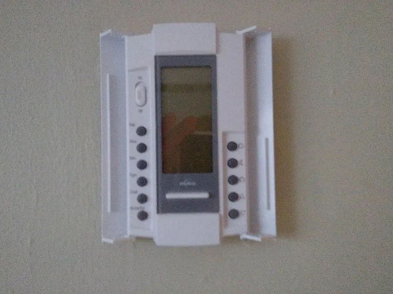 New programable thermostats in the bedroom and livingroom.