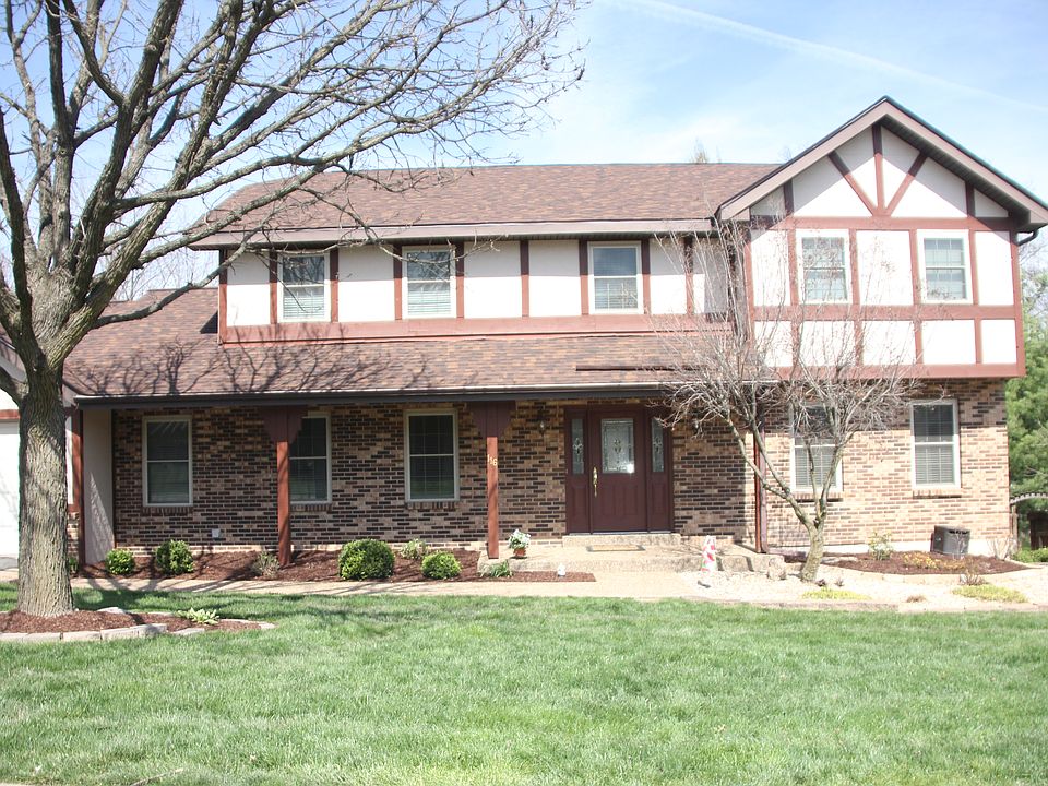 landscaped tudor 2-story