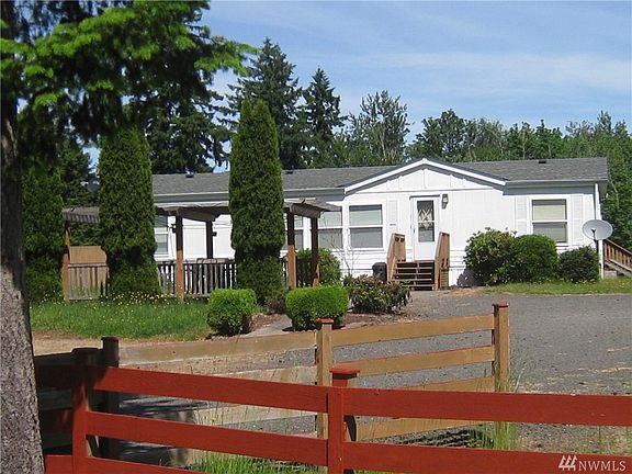 Large covered patio in the front.