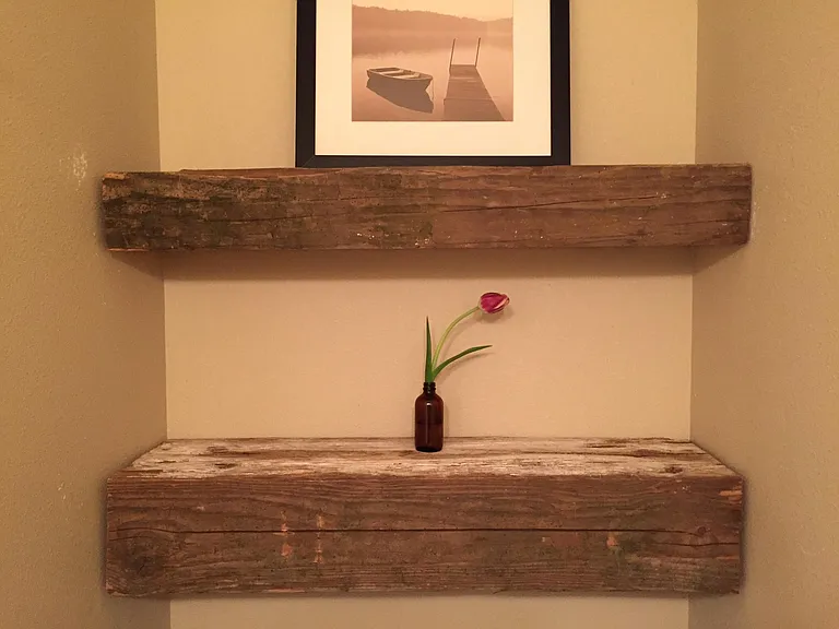 Hand hewn shelf beams in the bathroom.
