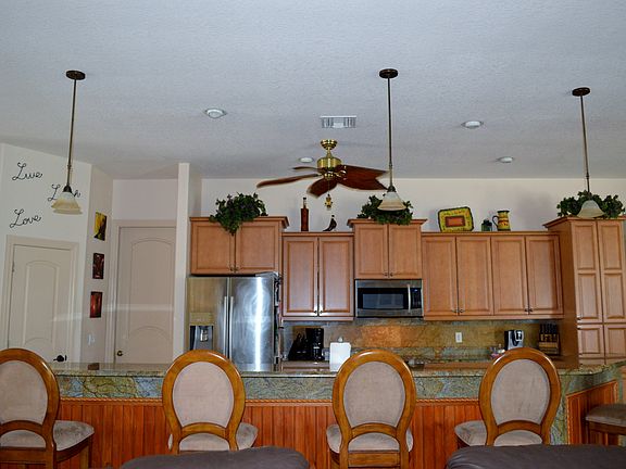 Kitchen with wood cabinets