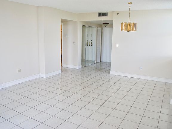 Living room view. Look towards entrance to unit.