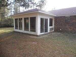 Fenced Rear yard / sun room