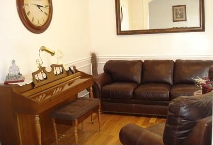Formal living room with brazilian maple hardwood floors