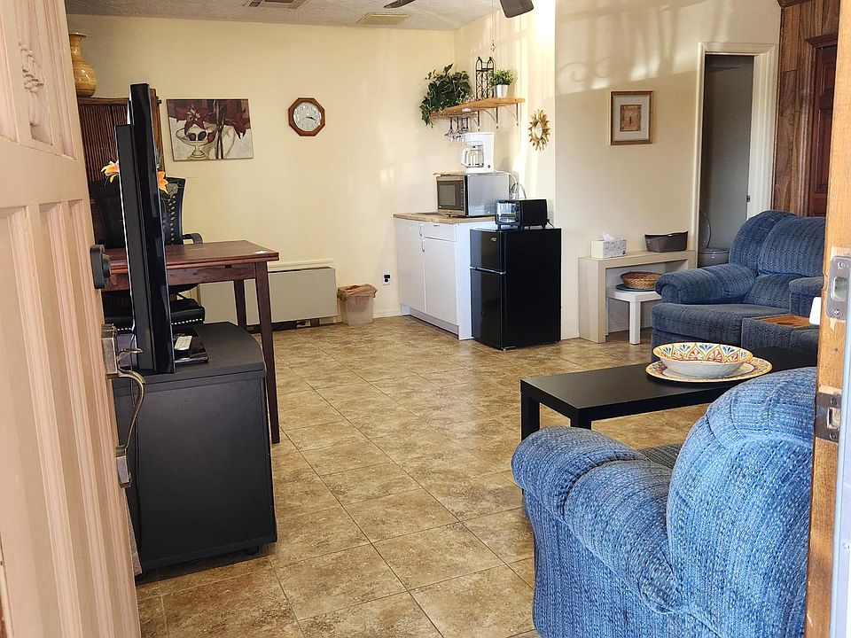 Looking in front door you can see the apartment is bright and inviting.