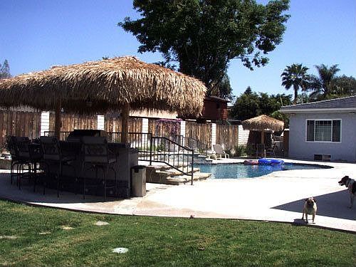 Backyard pool/outdoor kitchen (separate from horse area)