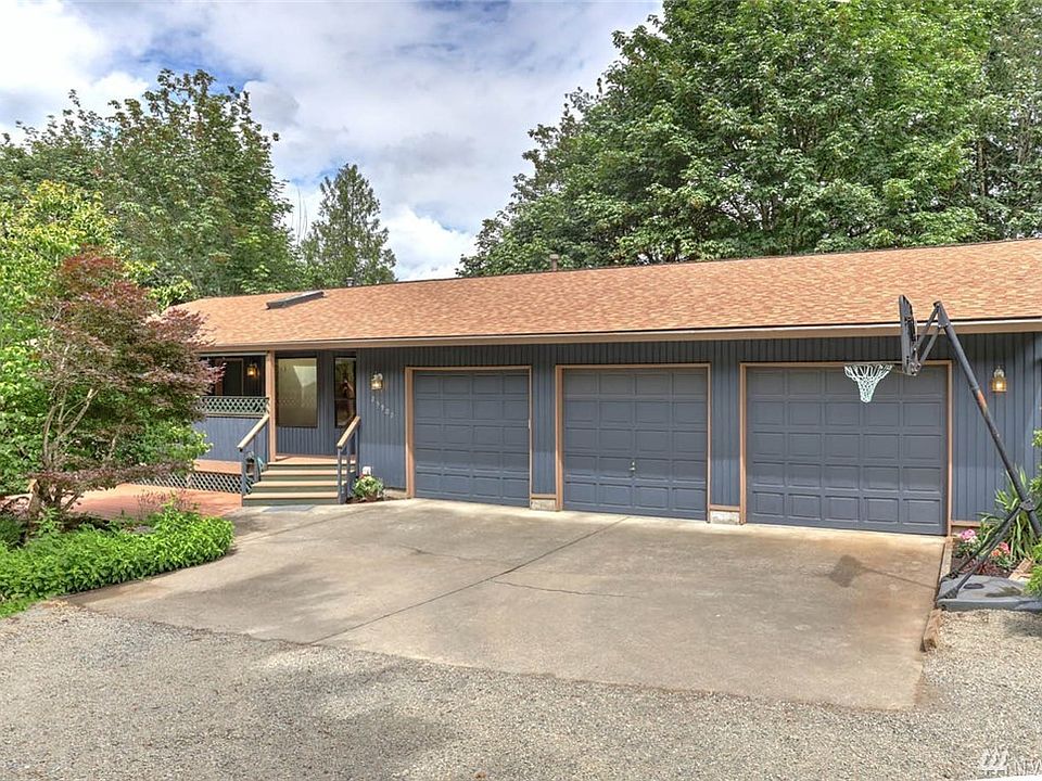 3 stall over sized garage with additional RV parking on the side