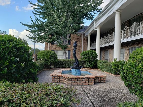 Complex's front garden and courtyard.