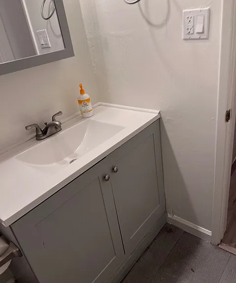 Designer vanity faucet medicine cabinet