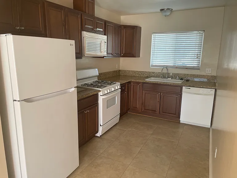 Spacious kitchen with granite countertops