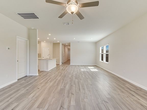 The Reynolds open concept floorplan works great for hosting guests.