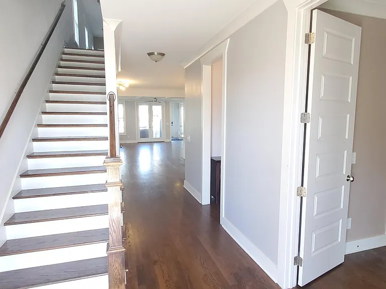 Front hallway and downstairs bedroom