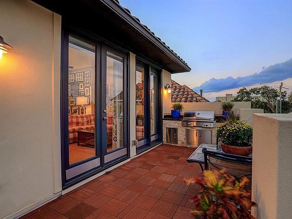 Fourth floor: a view of the rooftop terrace as seen from the outdoor firelace.