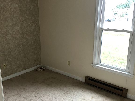 Third-bedroom with carpet.