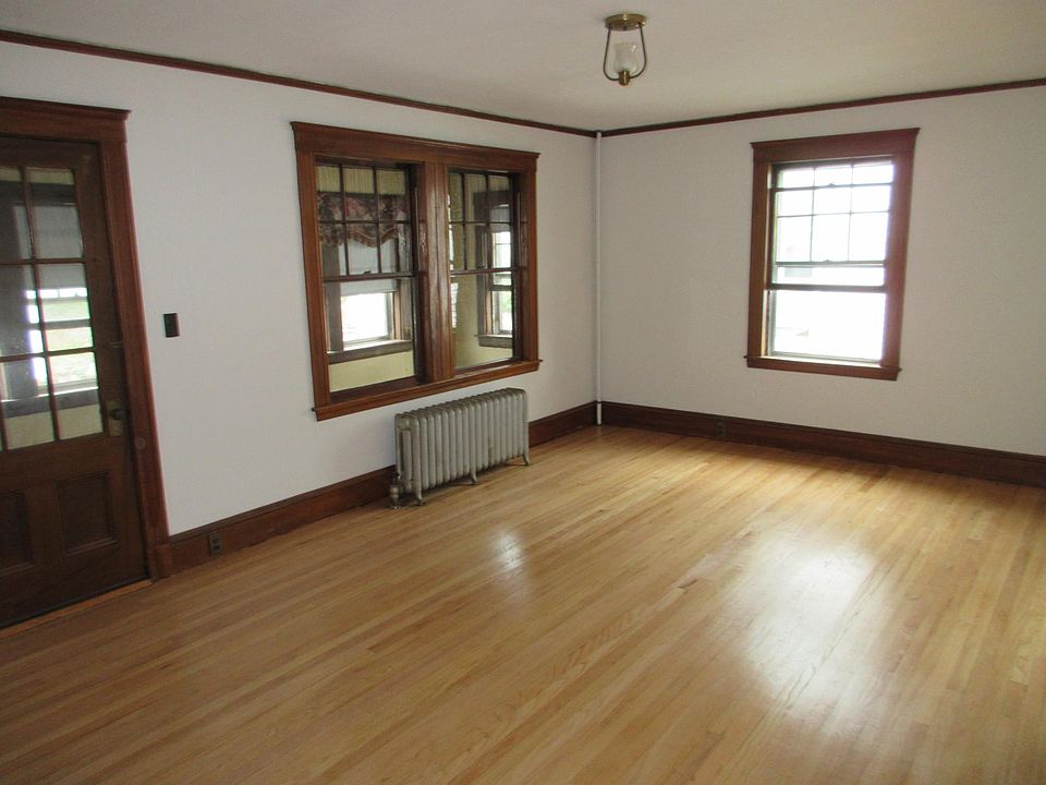 Living Room, spacious, newly refinsihed hardwood floors, large coat closet.