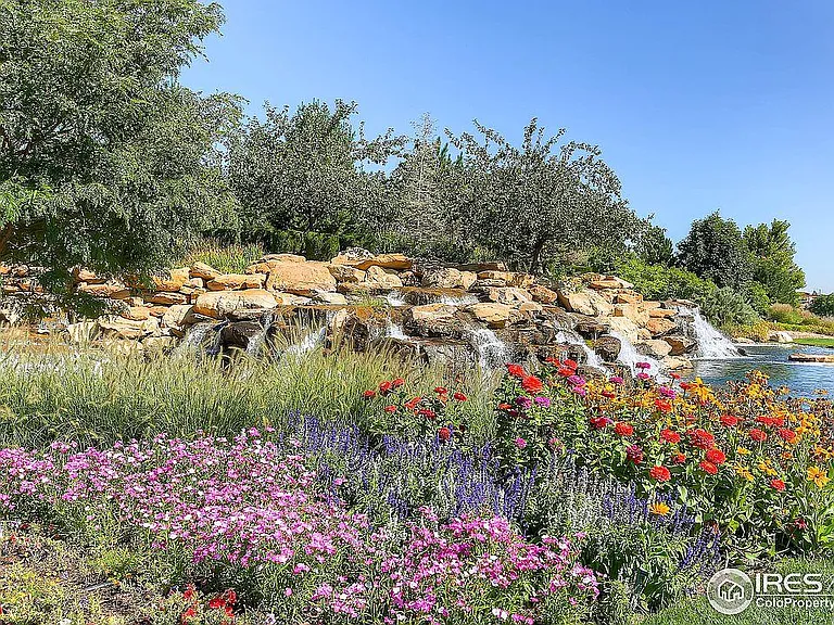 Community entry w/rock outcrop & waterfalls