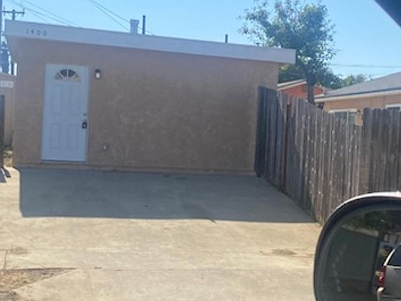 Picture of the unit and the parking spot. Its located in backyard where the kitchen window is facing.