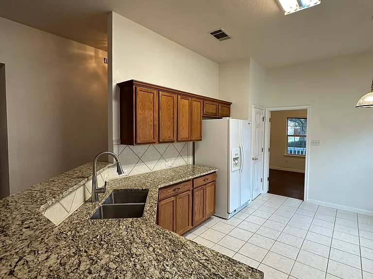 Kitchen. Note refrigerator is now stainless. See earlier photo.