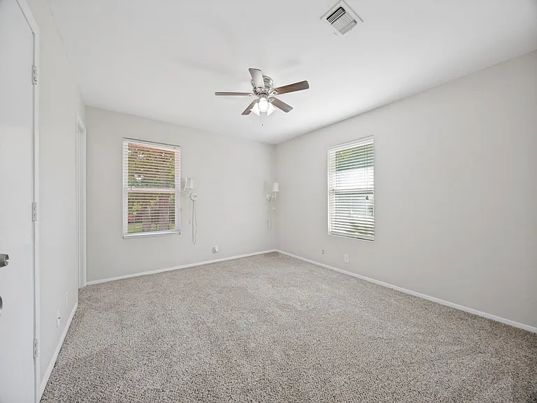 Primary bedroom. This bedroom has an ensuite half bath, plus a walk in closet!