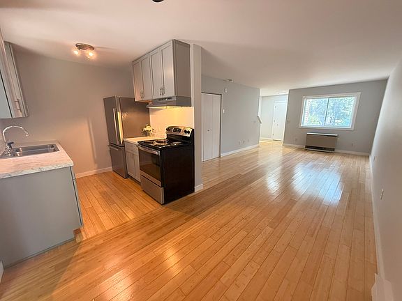 enjoy hardwood bamboo floors, open concept and lots of natural light!