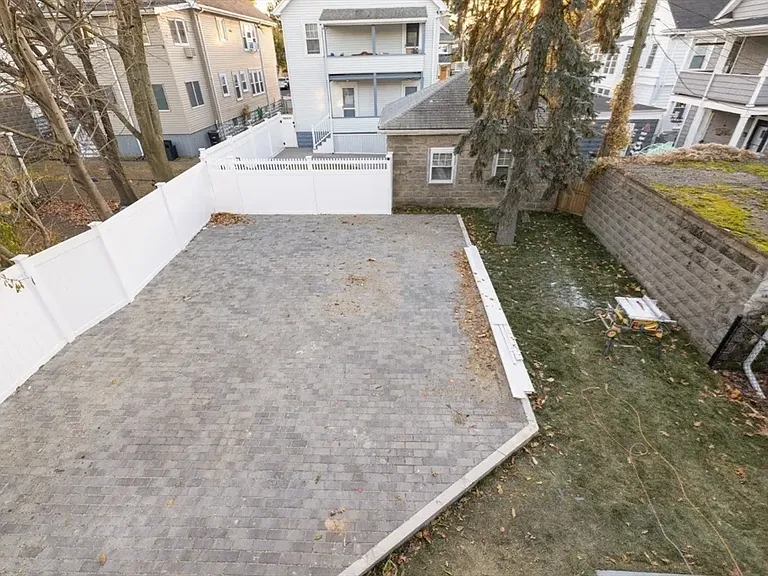 Rare Somerville perk: Dedicated off-street parking located conveniently at the rear of the property.