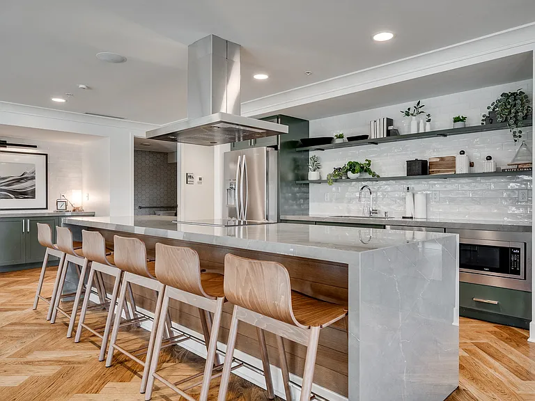 Host gatherings in our community kitchen with professional appliances and ample seating.