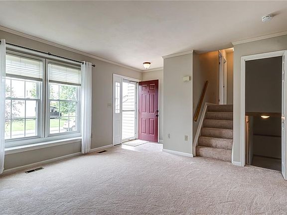 Fresh Paint and new carpeting welcome you into this inviting home.