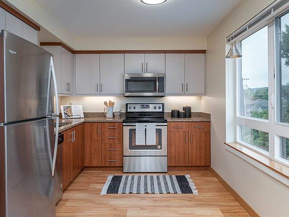 The Morgan ; Spacious Kitchen and adjoining Dining Area
