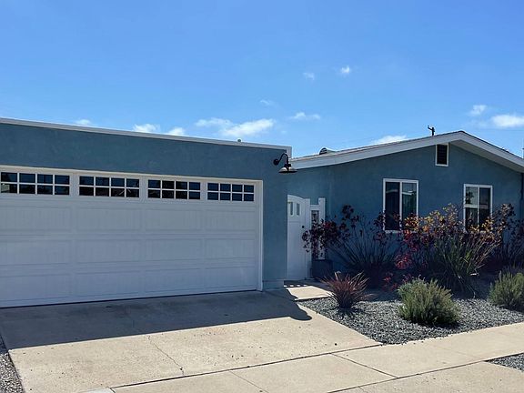 Front of house and detached two car garage