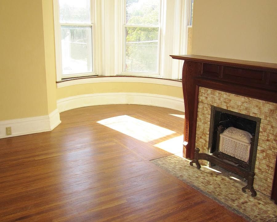 Living room with refinished hardwood