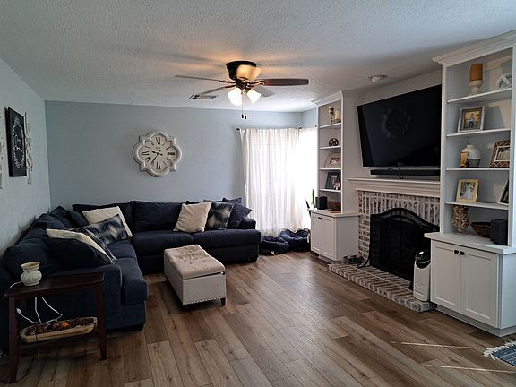 Secondary living space to the left of the open concept kitchen