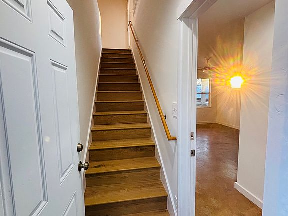 Entrance with master bedroom doorway on the right.
