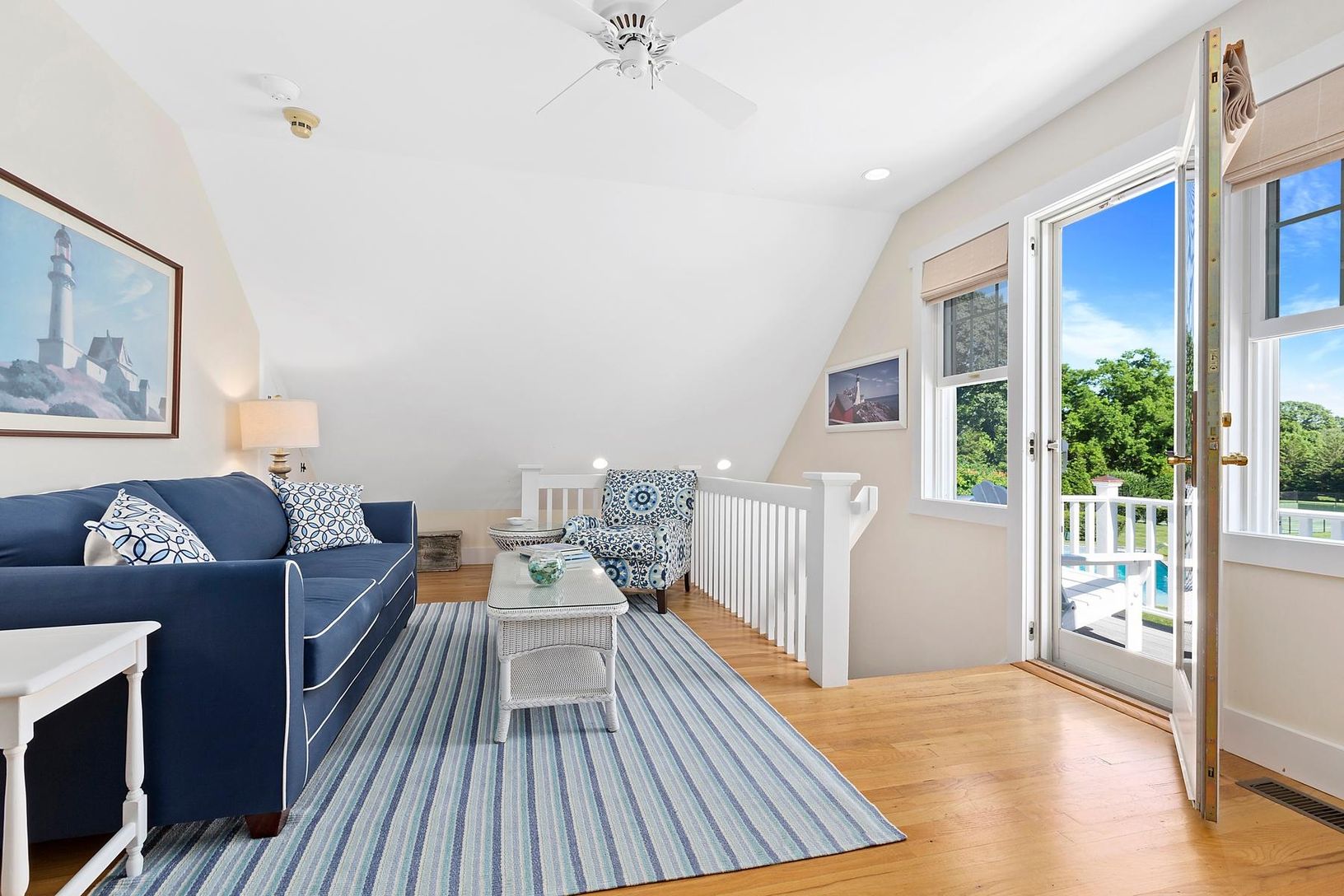 Apt. Living Rm with pull-out couch offering best view in the house from balcony chairs