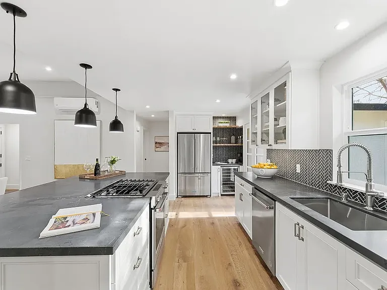 Open kitchen, view to refer and coffee/wine bar